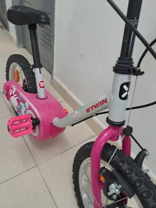 Bicicleta BTWIN infantil rosa con dibujos