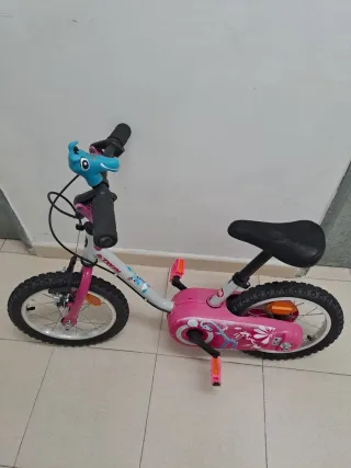 Bicicleta BTWIN infantil rosa con dibujos