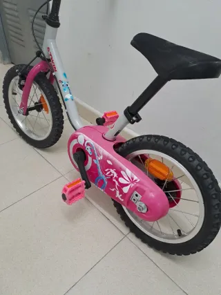 Bicicleta BTWIN infantil rosa con dibujos