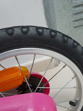 Bicicleta BTWIN infantil rosa con dibujos