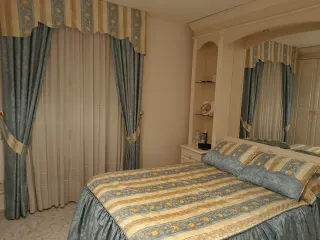 Colchas y cortinas de tela