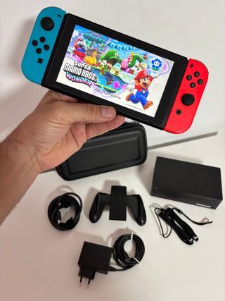 NINTENDO SWITCH V2 CON EXTRAS Y 128 GB