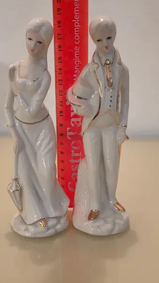 Coppia statuette porcellana con dettagli oro