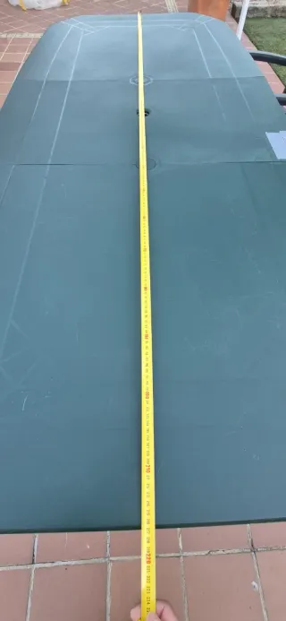 Mesa de exterior extensible.