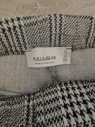 Pantalones de cuadros con abertura