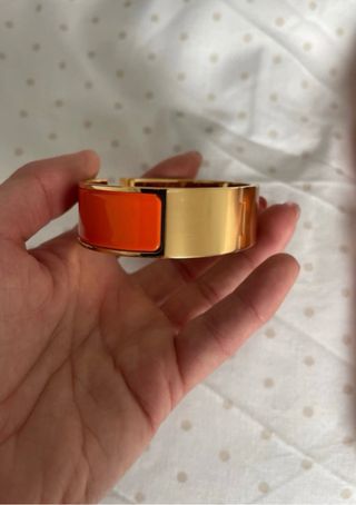 Brazalete Clic Clac Hermès Oro y Naranja