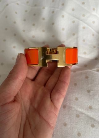 Brazalete Clic Clac Hermès Oro y Naranja