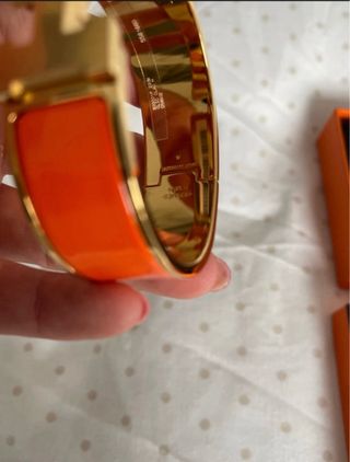 Brazalete Clic Clac Hermès Oro y Naranja