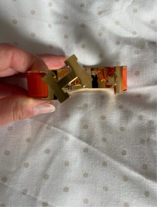 Brazalete Clic Clac Hermès Oro y Naranja