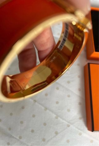 Brazalete Clic Clac Hermès Oro y Naranja