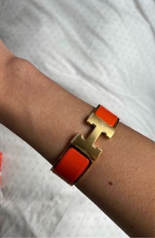 Brazalete Clic Clac Hermès Oro y Naranja