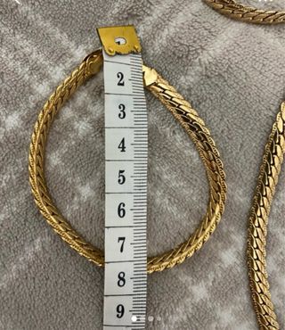 Conjunto collar y pulsera chapado en oro