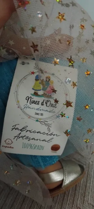 Muñeca artesanal con vestido estrellado