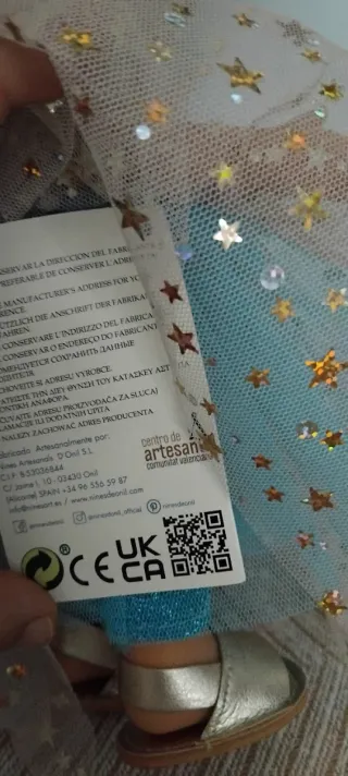 Muñeca artesanal con vestido estrellado