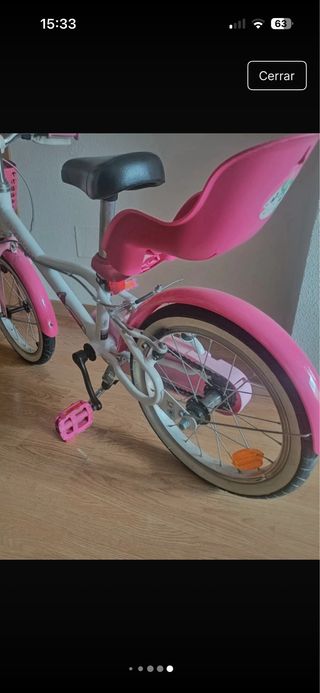 Bicicleta infantil rosa y blanca