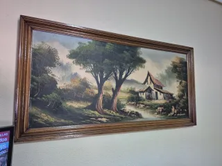Cuadro paisaje rústico casa y río.