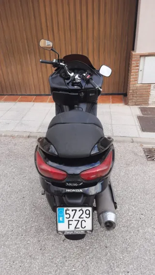 Honda Forza 250 averiada