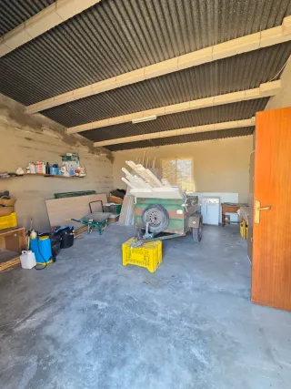 Casa de campo y terreno