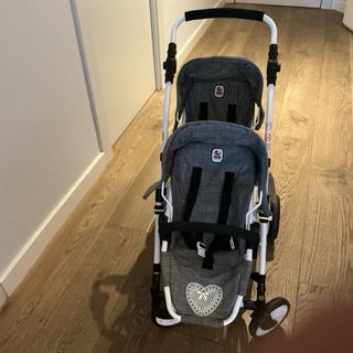 Carrito gemelar para muñecas