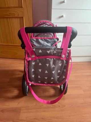 Carrito de muñecas gris con bolso rosa
