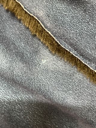 Cazadora O&C azul y marrón.