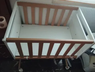 Minicuna con ruedas