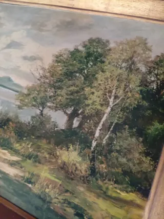 Marco grande de madera dorado