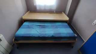 Habitación juvenil con dos camas