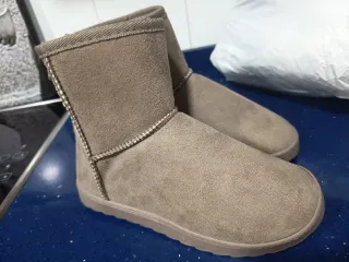Botas de invierno marrones gisaseas
