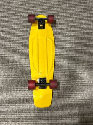 Skate amarillo Oxelo compacto