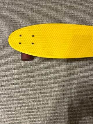 Skate amarillo Oxelo compacto