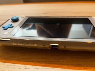 Nintendo Switch Lite Gris + Funda
