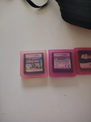 Nintendo DS Rosa + Blanca + 4 juegos