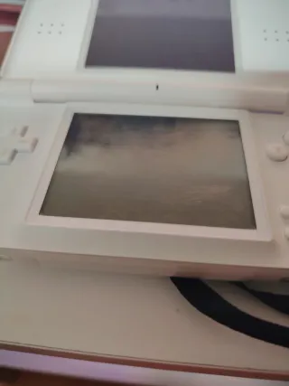 Nintendo DS Rosa + Blanca + 4 juegos