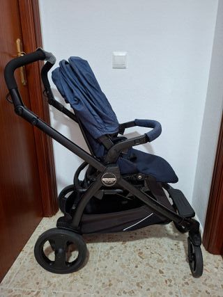 Carrito bebé azul con capazo y silla coche