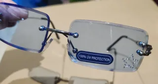 Gafas de sol sin montura plateadas y azules