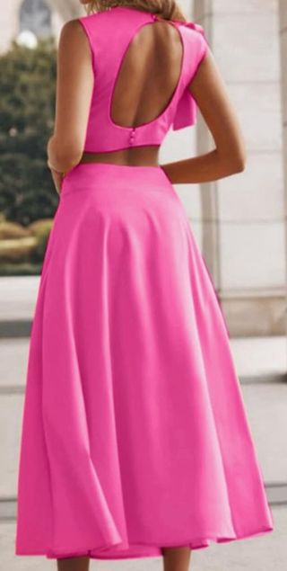 Conjunto rosa fucsia top sin mangas y falda