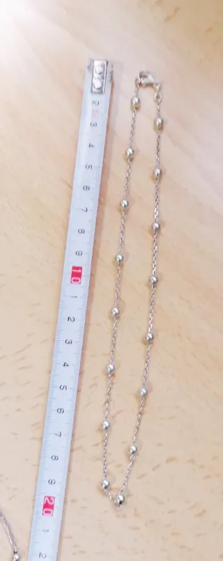 Collar de plata con caja corazón roja