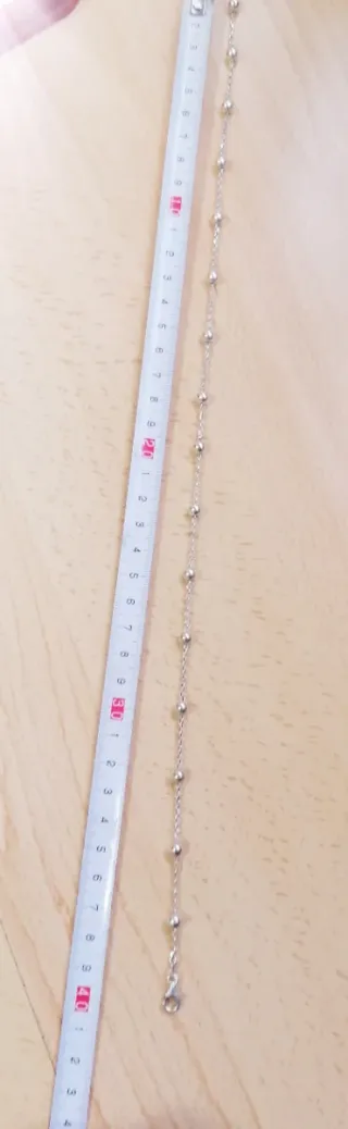 Collar de plata con caja corazón roja