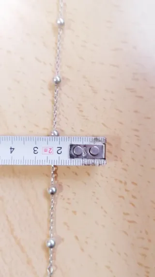 Collar de plata con caja corazón roja