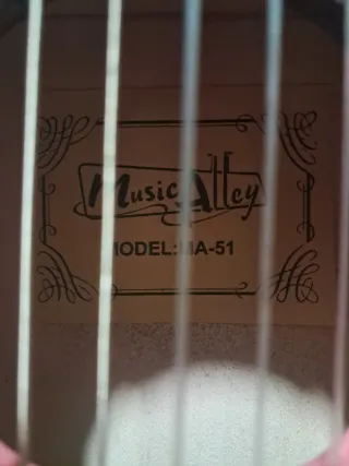 Guitarra rosa infantil