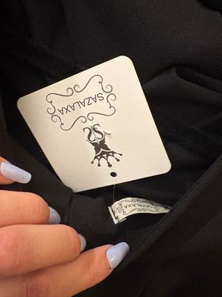 Traje de flamenca negro volantes