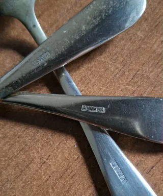 Antiguos cubiertos de alpaca