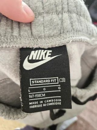 Pantaloni Nike Air grigi con inserti neri