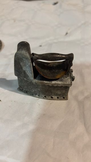 Plancha antigua de hierro fundido