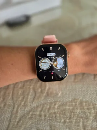 Smartwatch rosa nuevo con auriculares