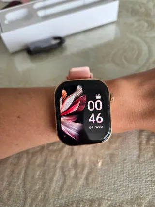 Smartwatch rosa nuevo con auriculares
