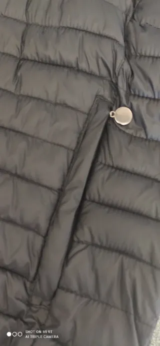 Piumino tecnico unisex nero. Mai utilizzato