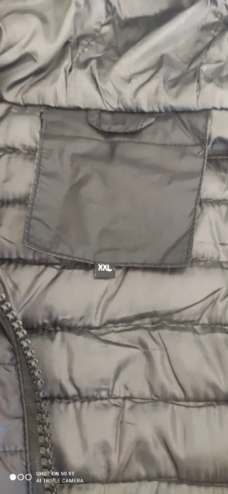 Piumino tecnico unisex nero. Mai utilizzato