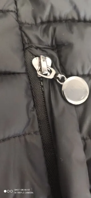 Piumino tecnico unisex nero. Mai utilizzato